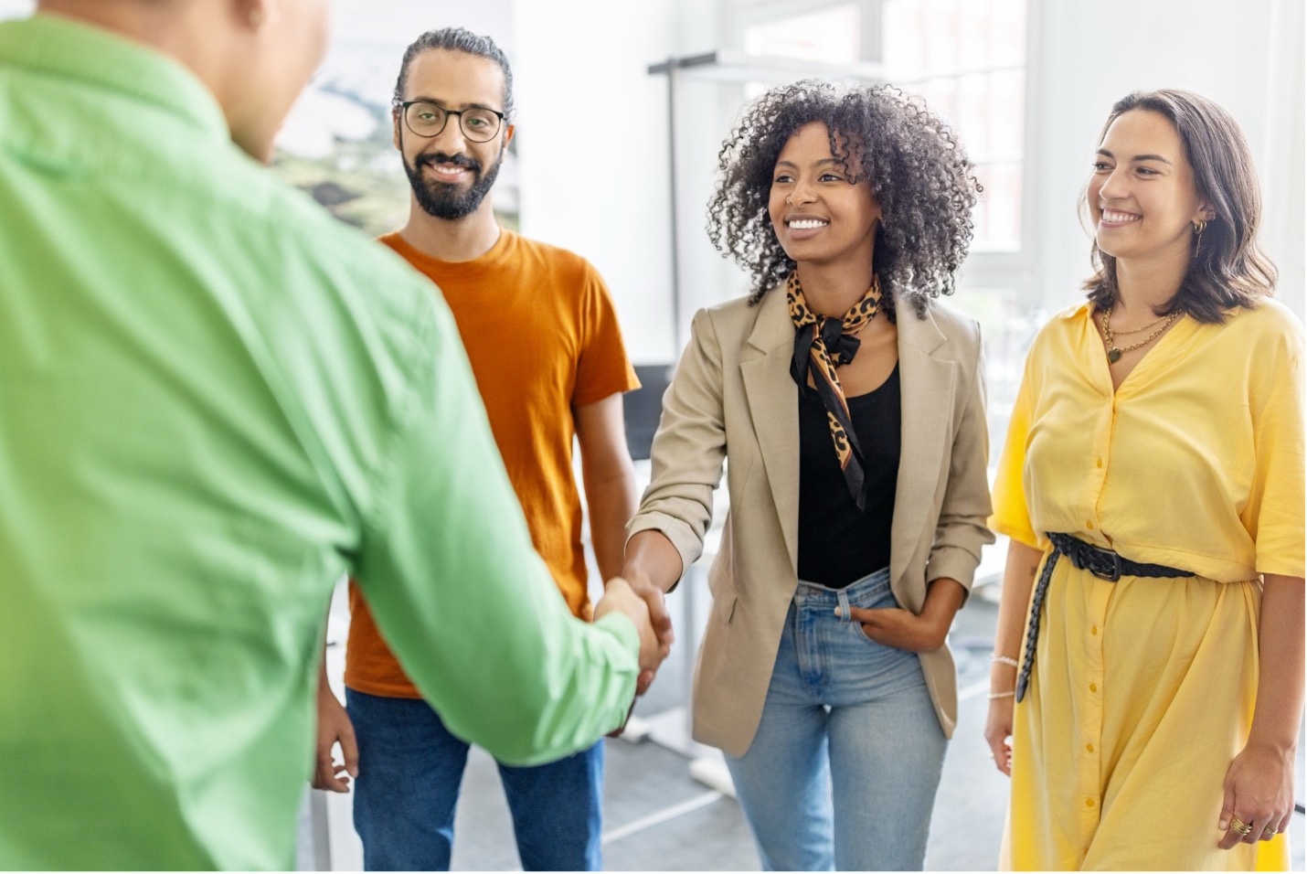 Smiling people welcoming a new Forum member
